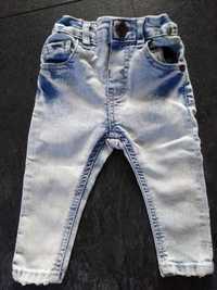 Spodnie jeansy przecierane 68
