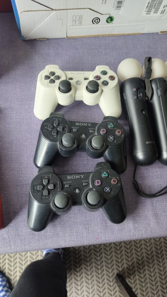 PS3 Super Slim desbloqueada, move, microfones e muitos extras