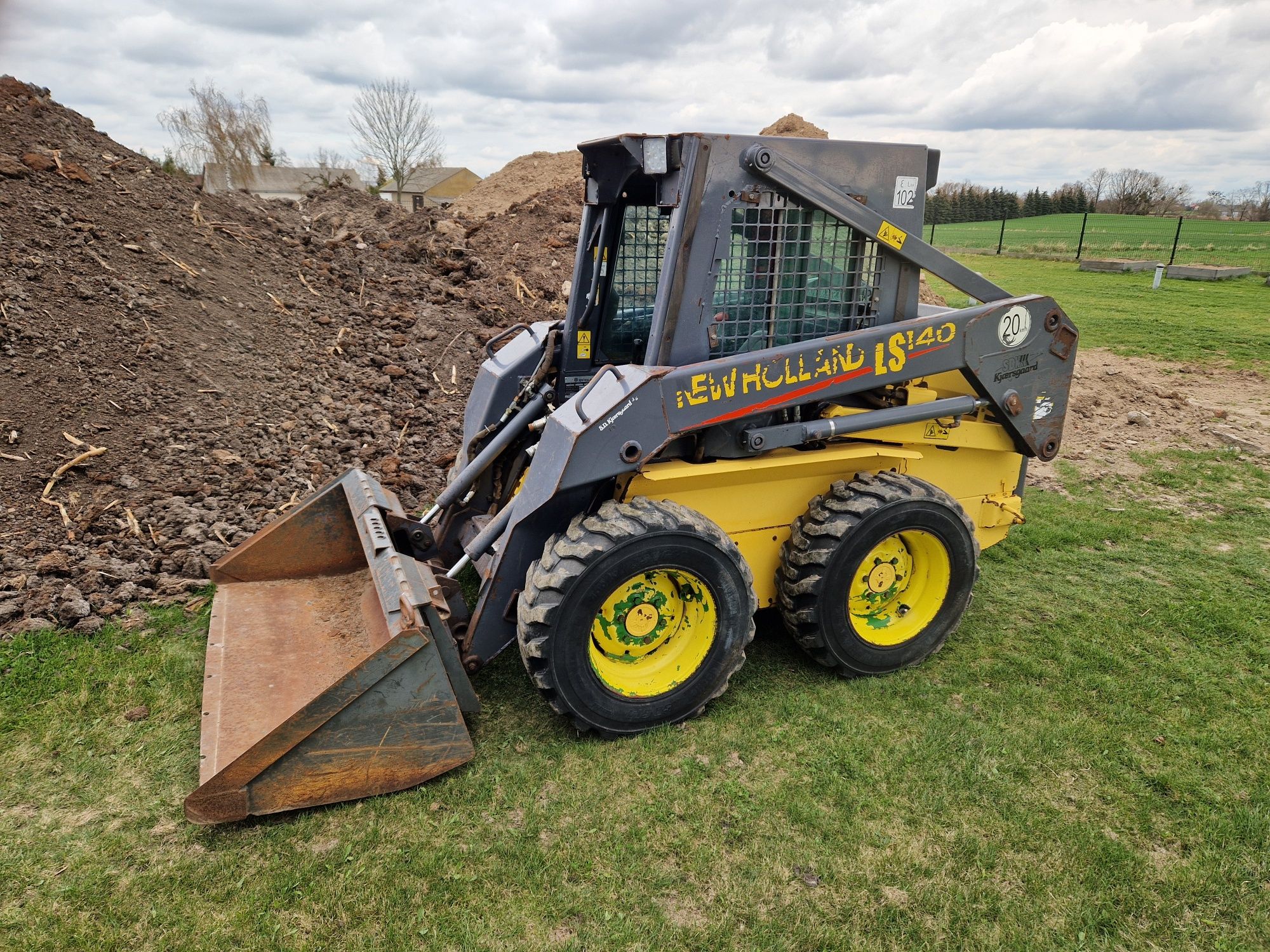 Miniładowarka New Holland LS140 Stan BDB Bobcat