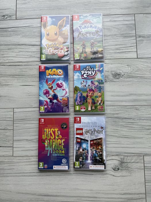 Nintendo Switch OLED plus 6 gier