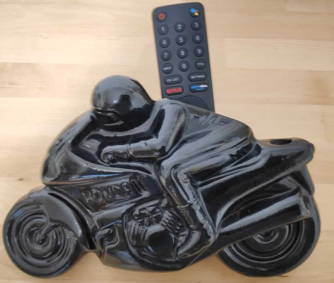 Moto - Porta comandos TV.