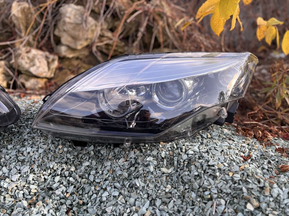 Renault Laguna 3 2011-2015 фари оригінал ксенон