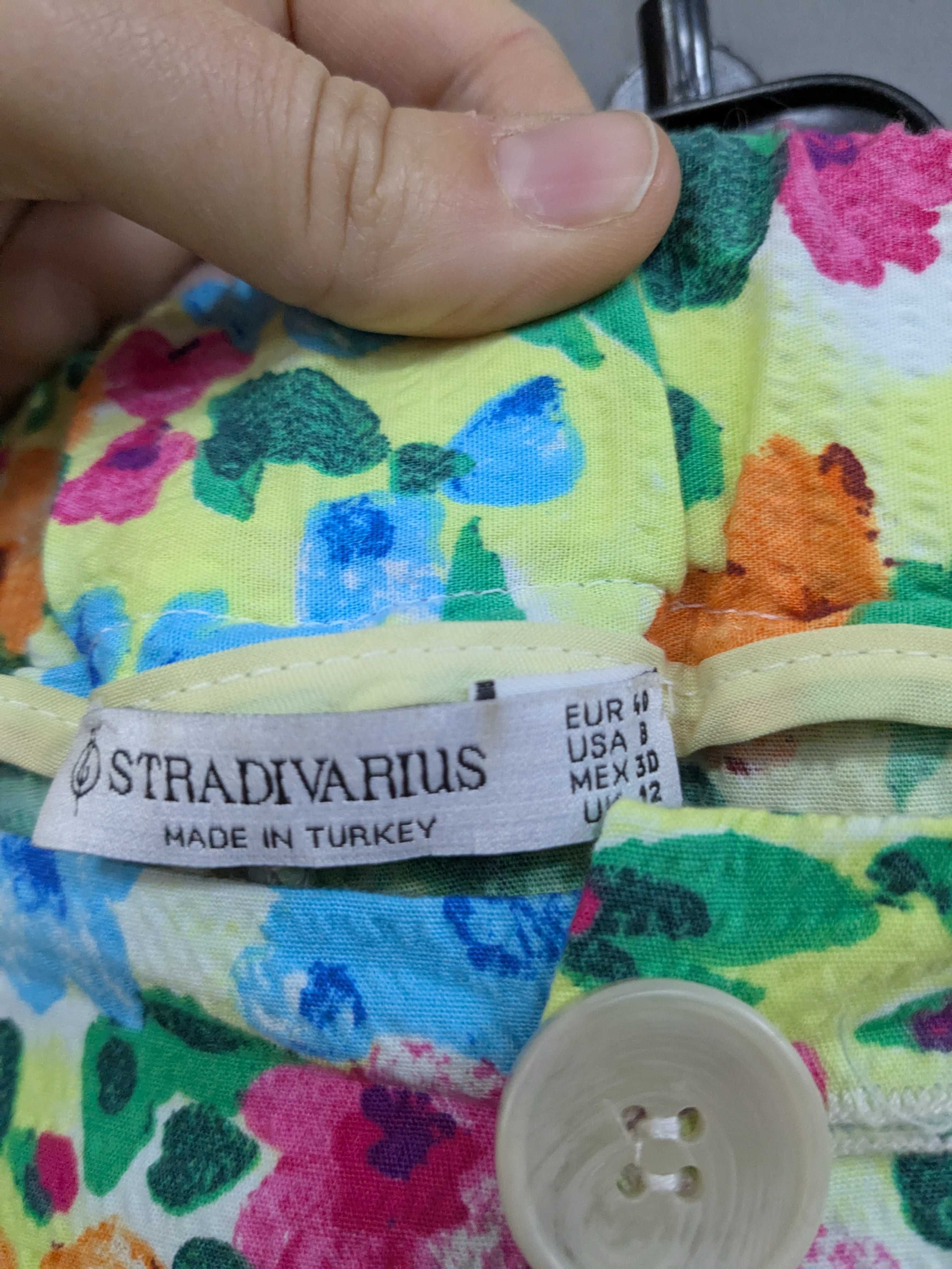 Stradivarius luźne spodnie z szeroką nogawką w kwiaty rozm. 40
