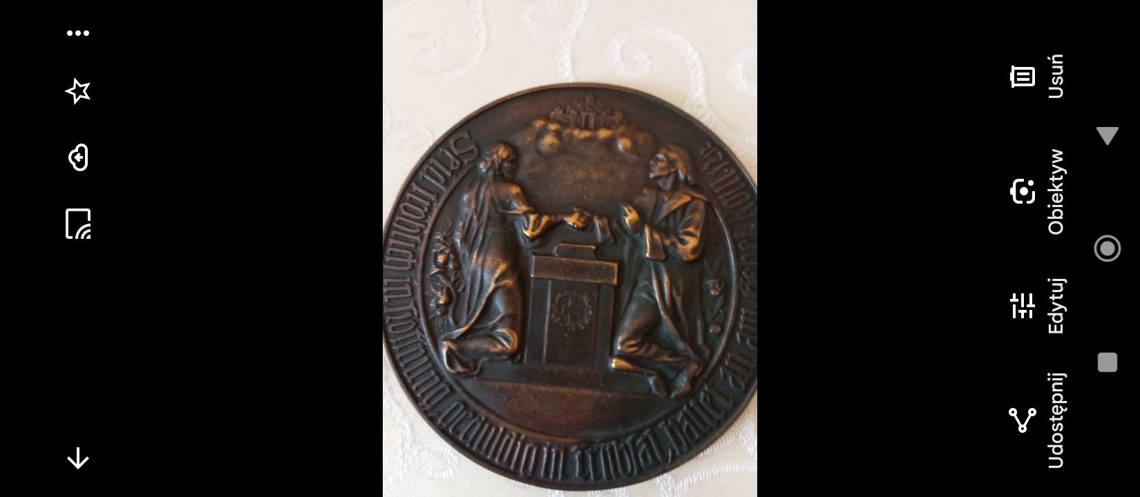 Stary medal z brazu