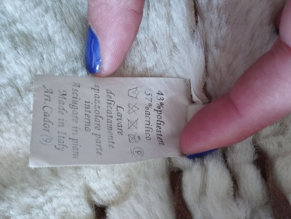 Colete de pele com pêlo dentro