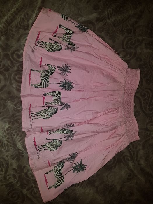 Rezerwac Różowa kloszowa spodnica dziewczęca w zebry 146-152