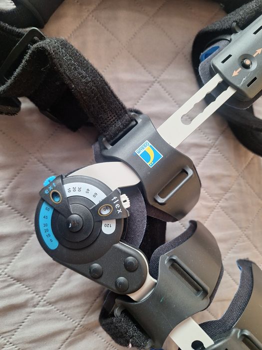 Orteza stawu łokciowego lewego z zegarem ÖSSUR z instrukcją