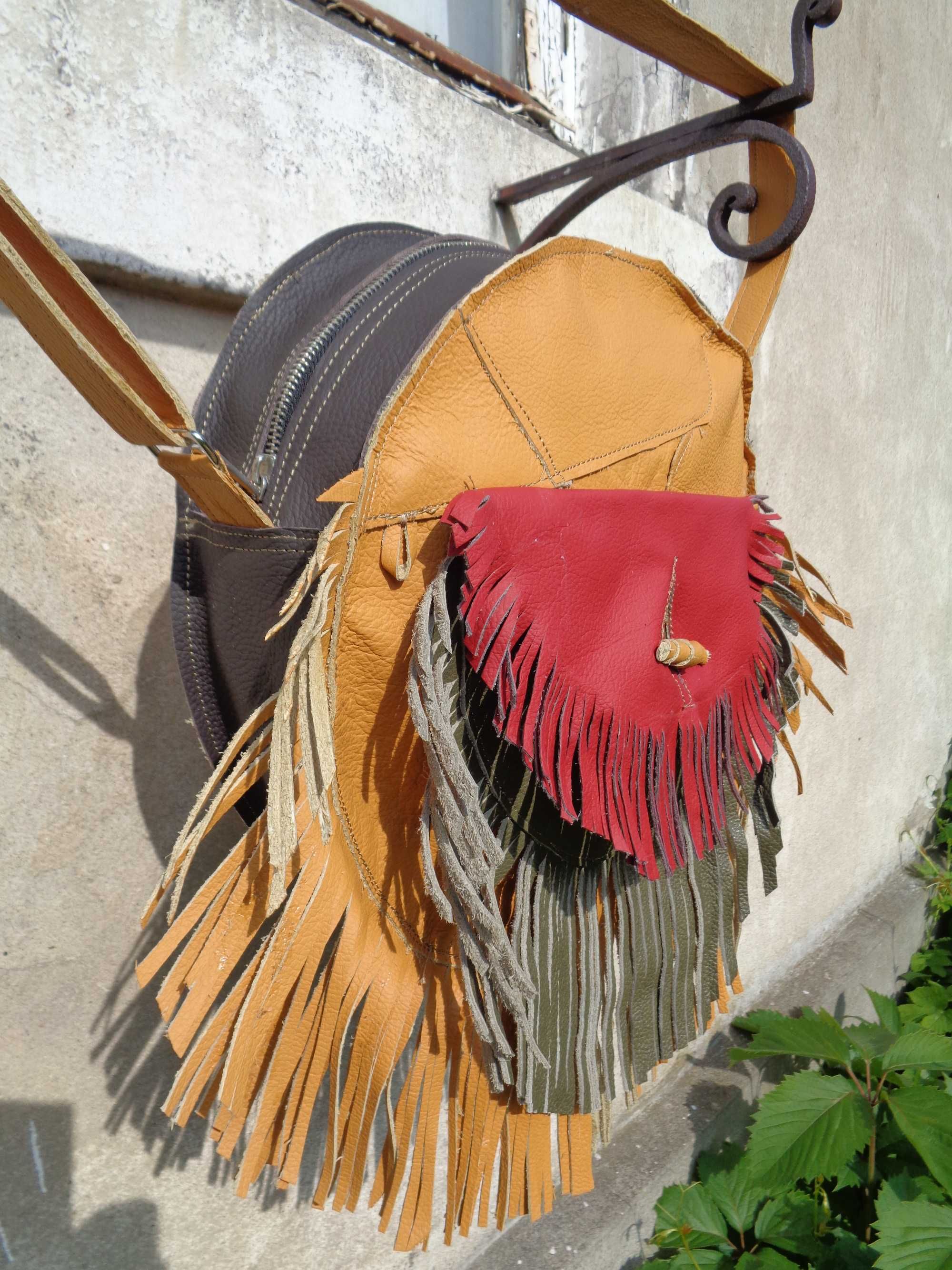 Artystyczna skórzana okrągła torebka z frędzlami. Handmade