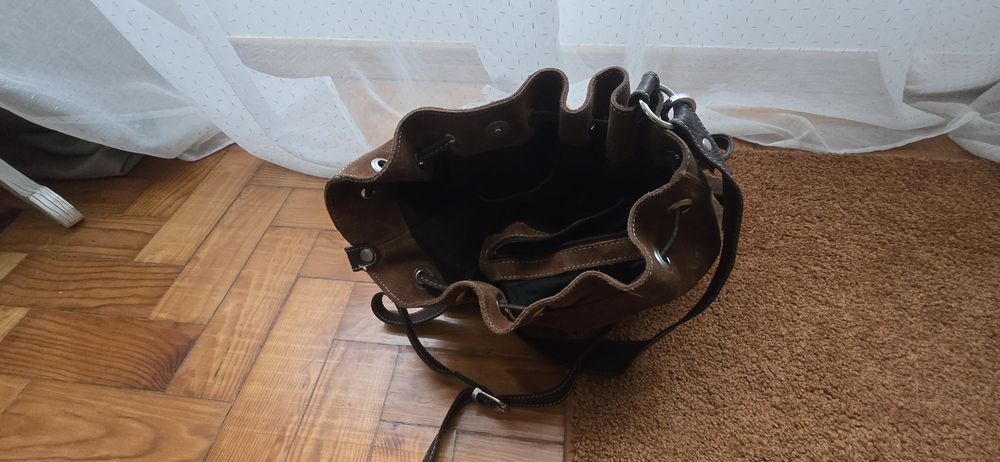 Mala castanha em pele