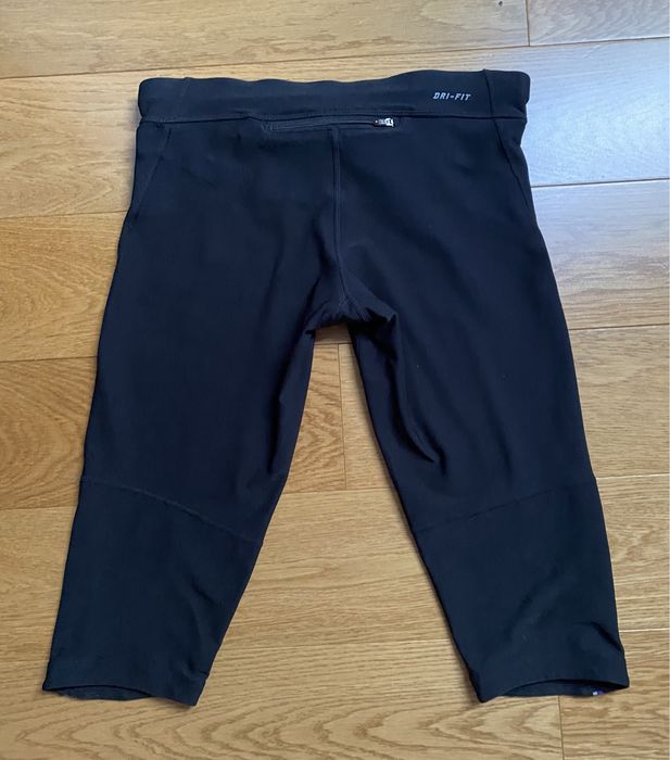 Damskie legginsy getry spodenki 3/4 sportowe do biegania Nike roz. S