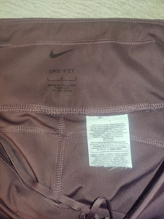 леггінси для йоги nike колір сливовий р. l/ m