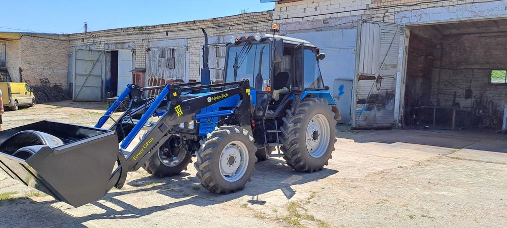 Быстросйомный фронтальный погрузчик кун Юмз