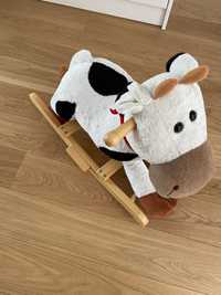 Zabawka krowa na biegunach