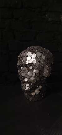 Скульптура из металла голова из монет Украины