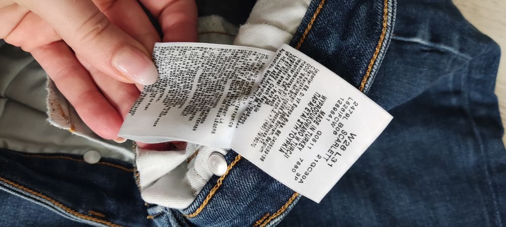 Spodnie jeansy Lee, rozmiar W28, L31.