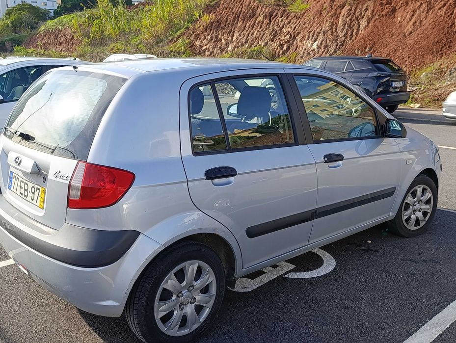 Getz 2007, AC, direção, travas e vidros elétricos