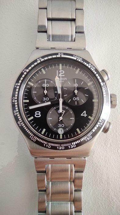 Relógio em aço inoxidável SWATCH NIGHT FLIGHT