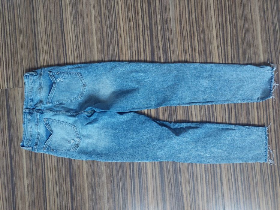 Spodnie jeansy z dziurami skinny 38 M