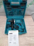 Makita HP1631 ударний дриль 710Вт + біти сверла головки,  в кейсі