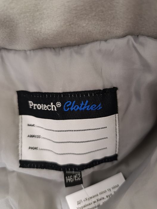 Зимова фірмова куртка на ріст 146-152