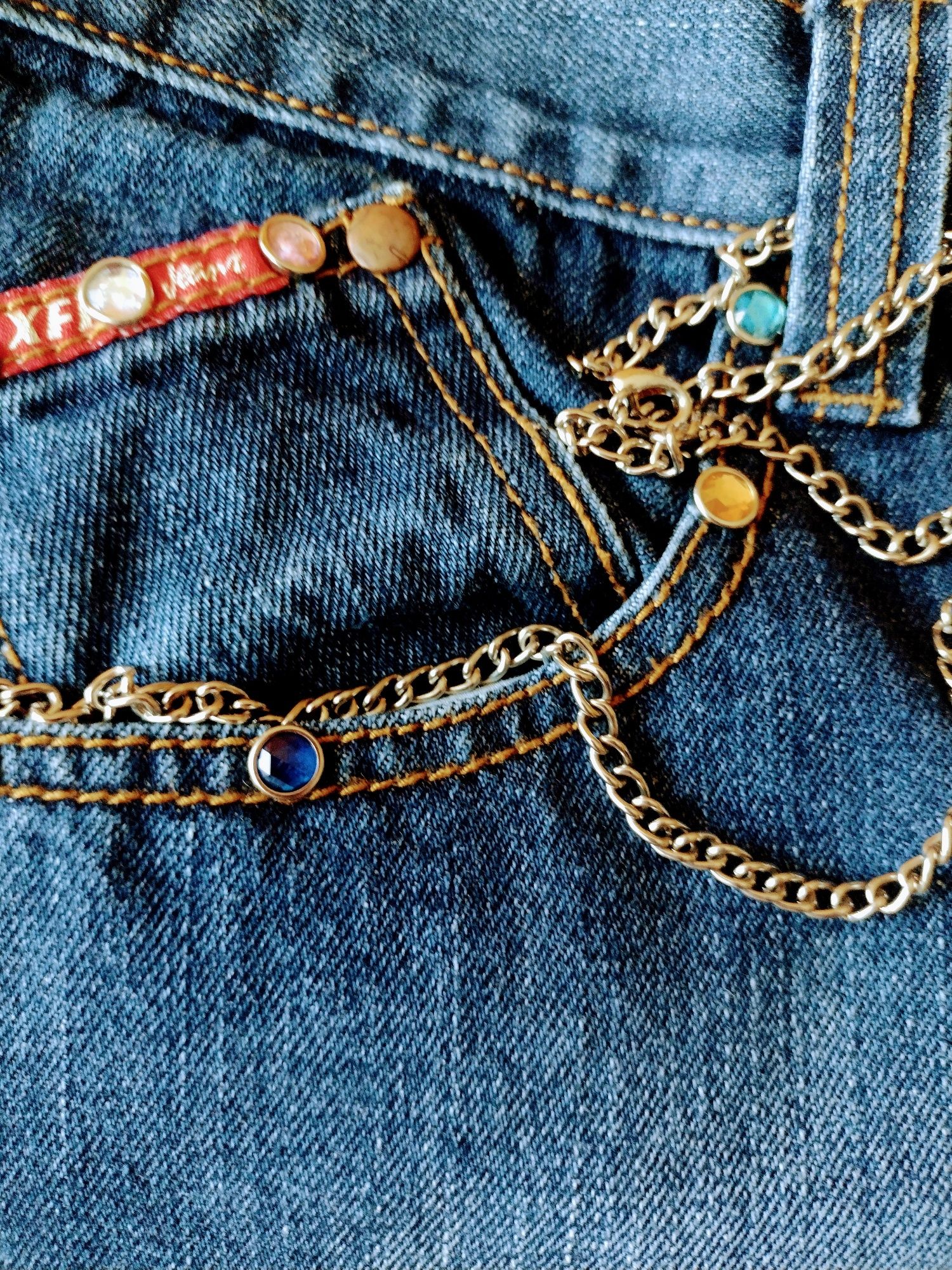 spodnie dżinsowe damskie lub męskie z ozdobnymi aplikacjami r.XL