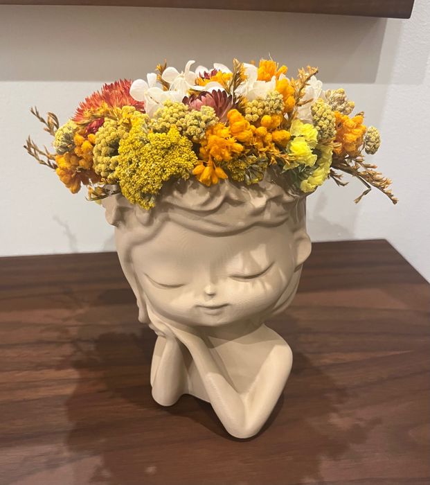 Vaso decorativo de menina