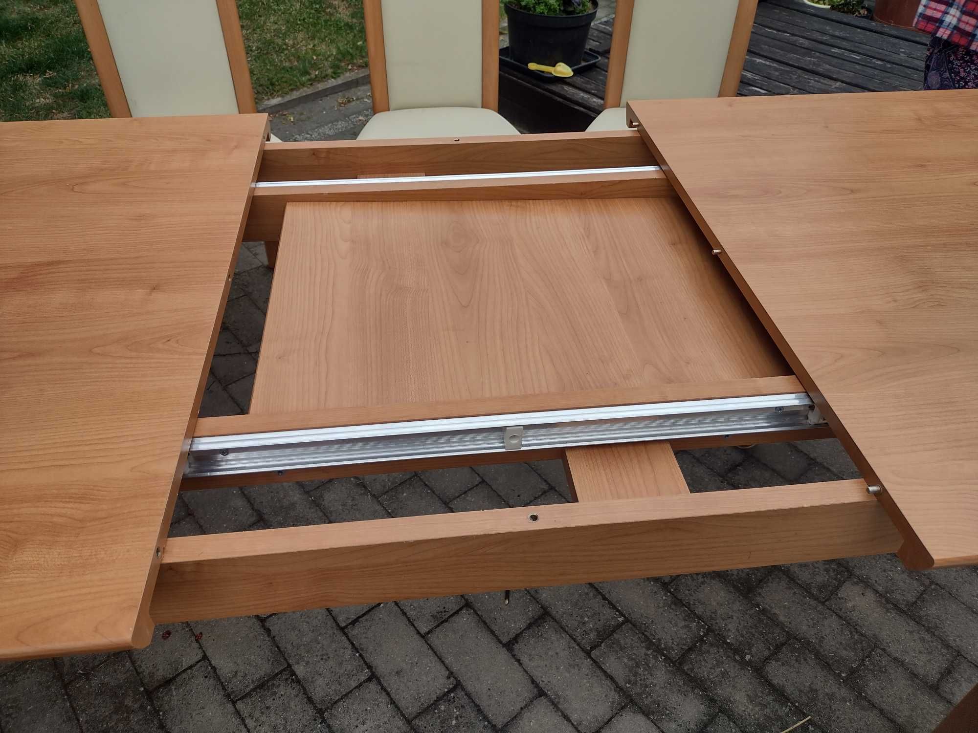 stół i 6 tapicerowanych krzeseł do jadalni BUK jasna skóra (UŻYWANE)