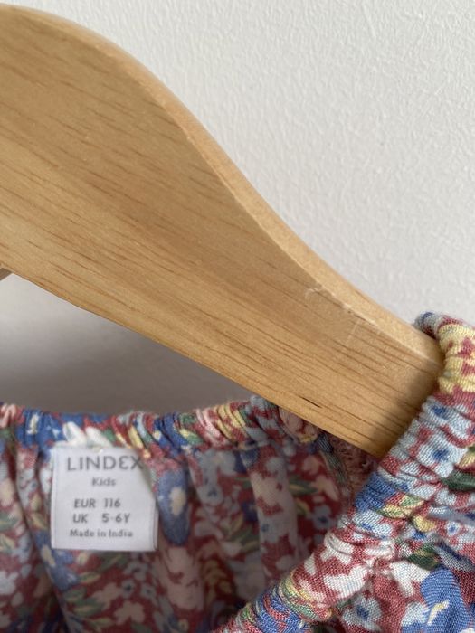 Kombinezon letni lindex 116 kwiatki drobne niebieskie