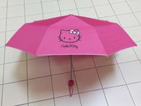 Śliczny parasol z nadrukiem Hello Kitty, licencyjny.