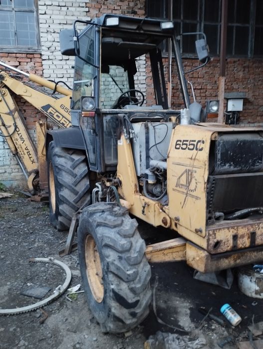 Екскаватор навантажувач , можливо і по з/ч