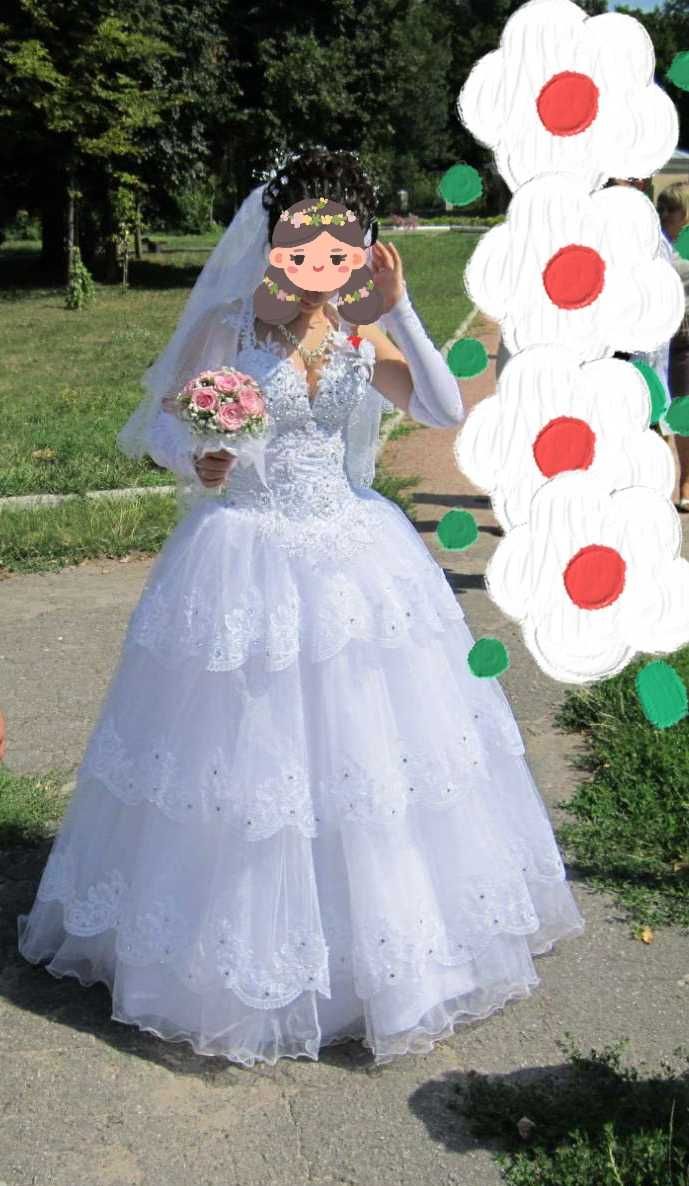 Весільна сукня    .