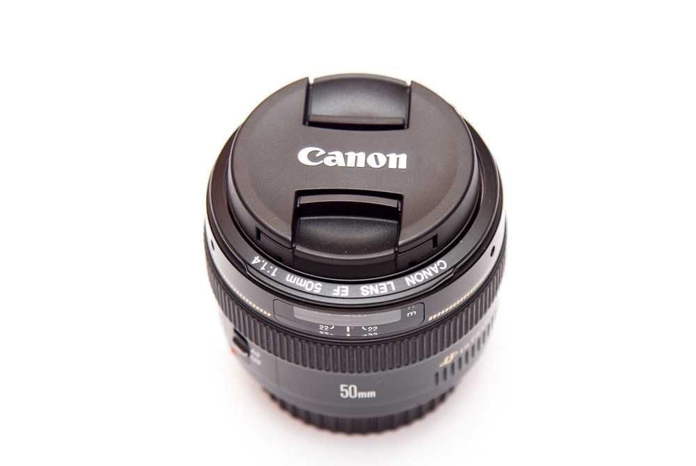 Canon EF 50mm f/1.4 USM, состояние отличное, но тугой автофокус