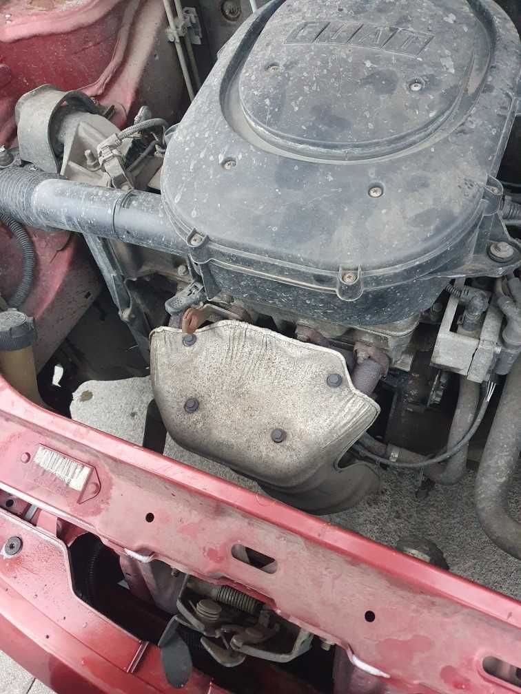 Fiat Punto II 1.2 benzyna 8V 5drzwi kolor wiśniowy 132/F na części