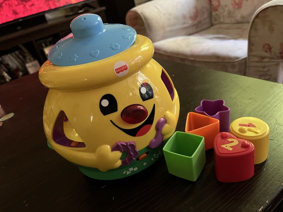 Garnuszek na klocuszek Fisher Price