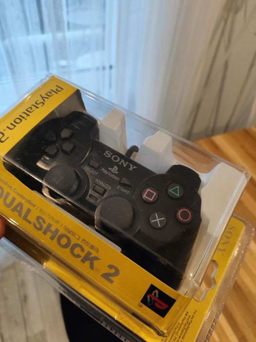 Pad po konsoli ps2