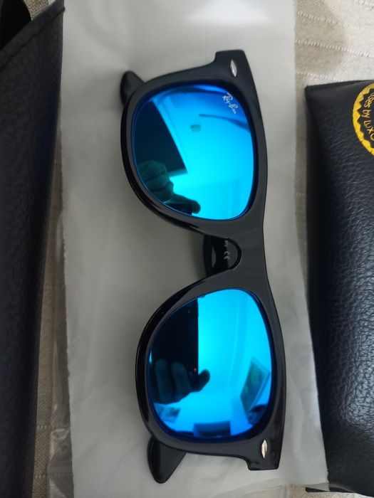 Oculos de sol .motivo fecho de loja