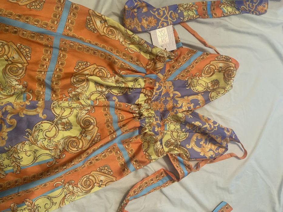 Macacão novo com etiqueta