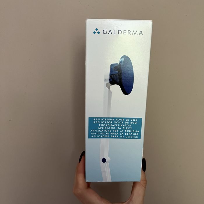 Uchwyt do aplikacji produktu na plecy