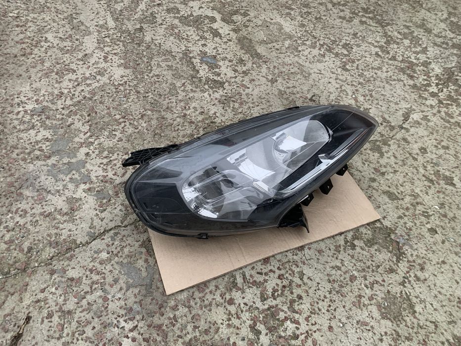 Права фара Fiat Doblo оригінал чорна фіат добло