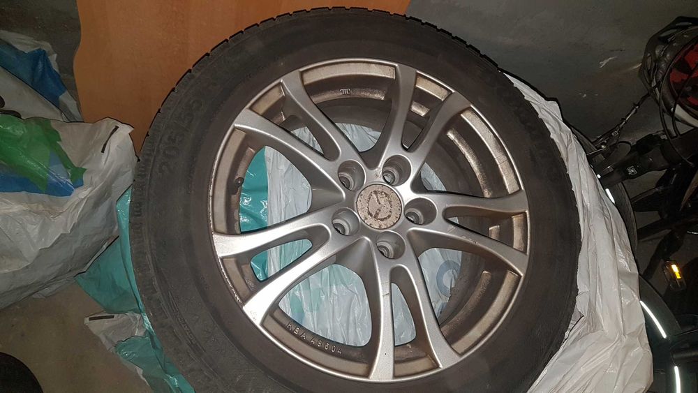 Opony zimowe na felgach alu 205/55 R16 Barum + 2 letnie 215/50R17