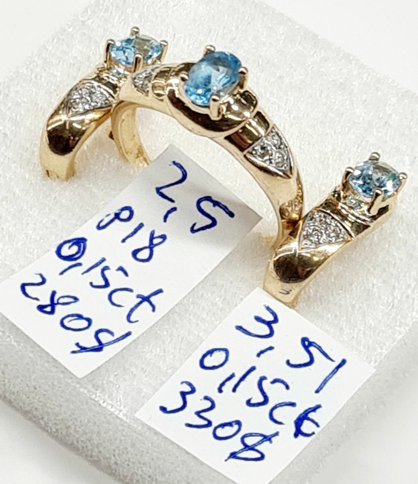 Продам комплект кольцо и серьги с бриллиантами и топазами