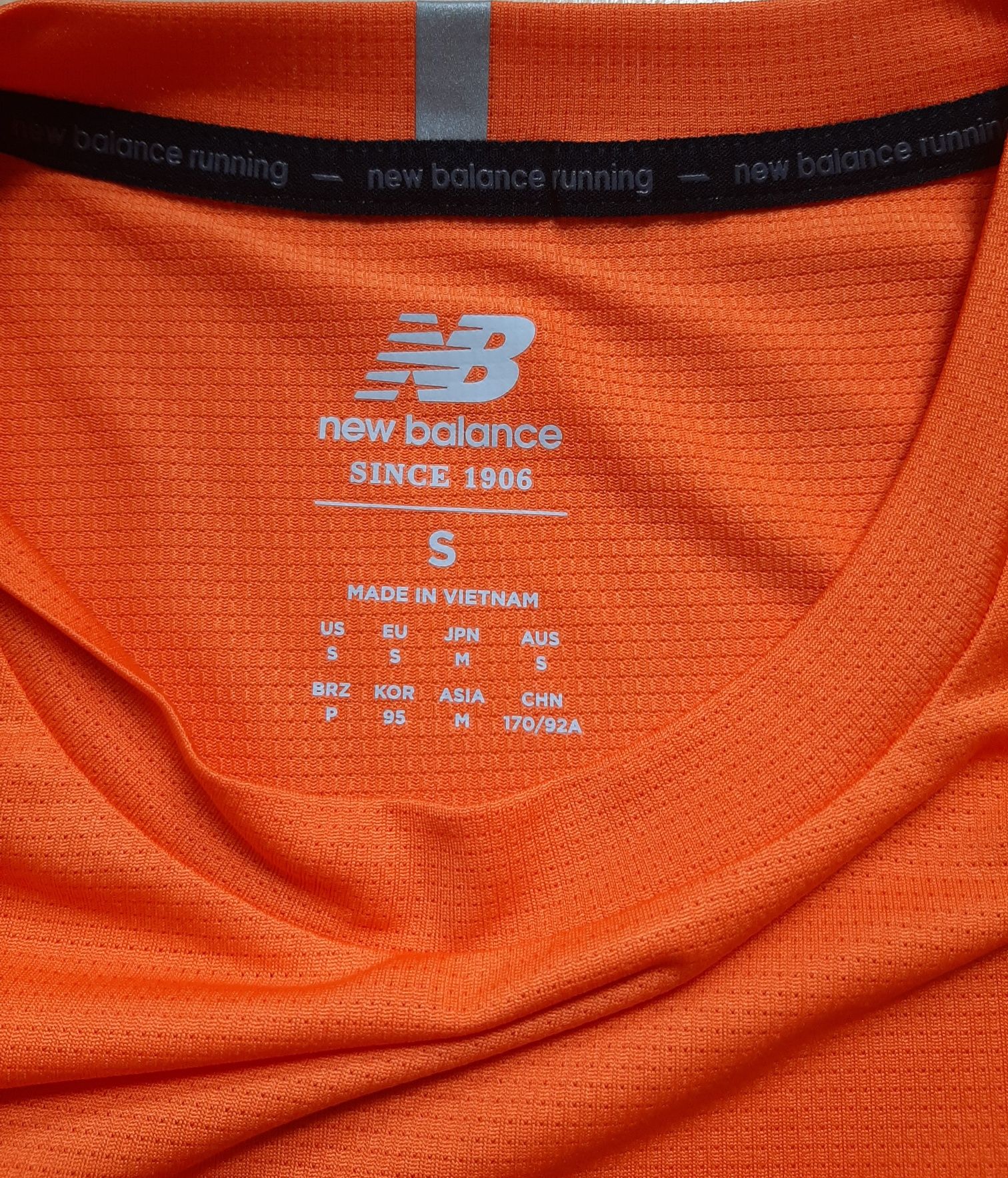 Pomarańczowa, szybkoschnąca koszulka NEW BALANCE, roz. S
