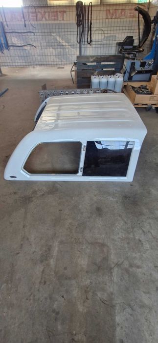 Cobertura Caixa Nissan Navara D40