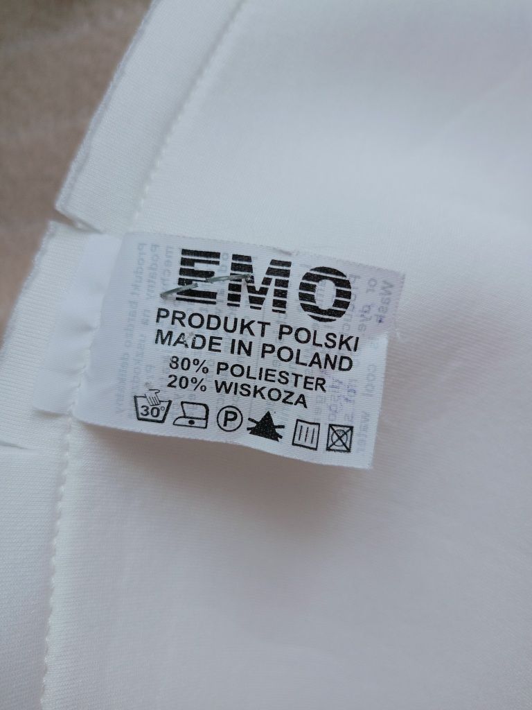 Piękna rozkloszowana sukienka z cekinami.