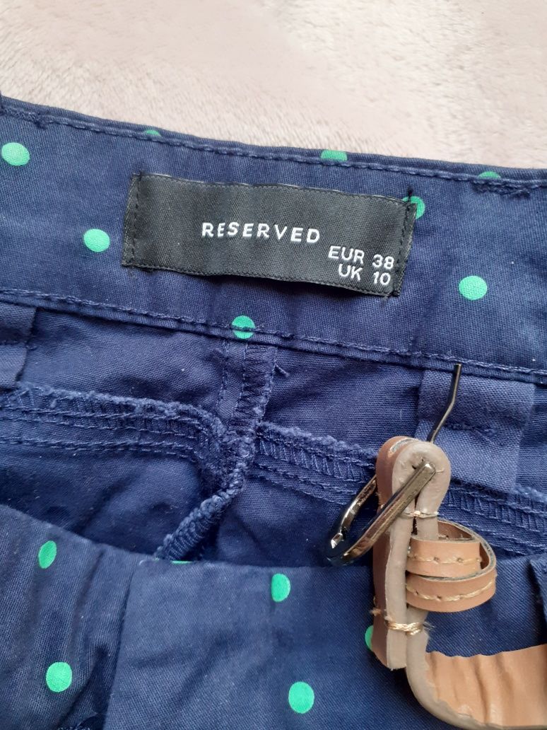 Piękne nowe spodnie w groszki Reserved 38 M