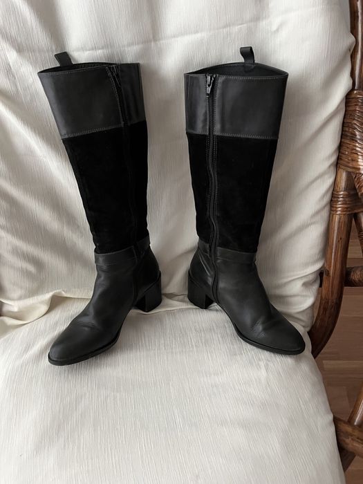 Botas pretas de cano alto