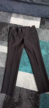 Czarne spodnie damskie Mohito roz. 38