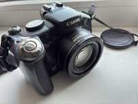 Canon S5 is zoom 12x