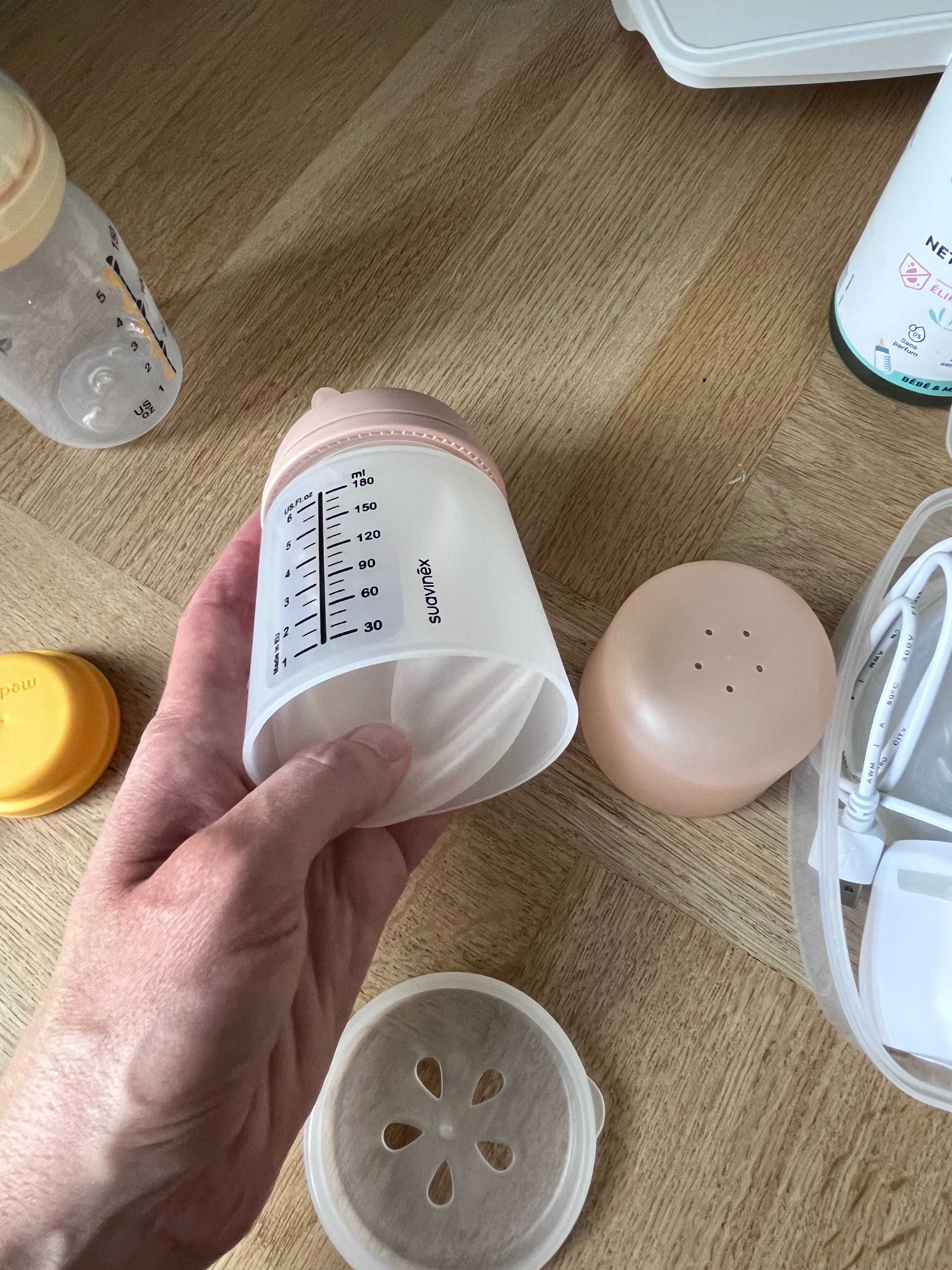 Bezprzewodowy laktator Bellababy + akcesoria do przechowywania mleka