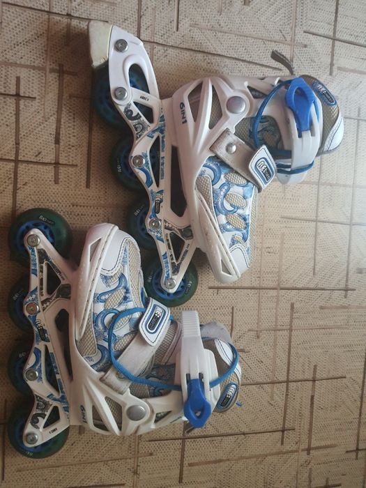 Роликовые коньки Re:Action р.26-31 б/у с защитой и шлемом